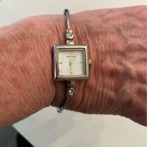 Anne Klein square face gold, silver & zirconium watch; 753H; stainless back